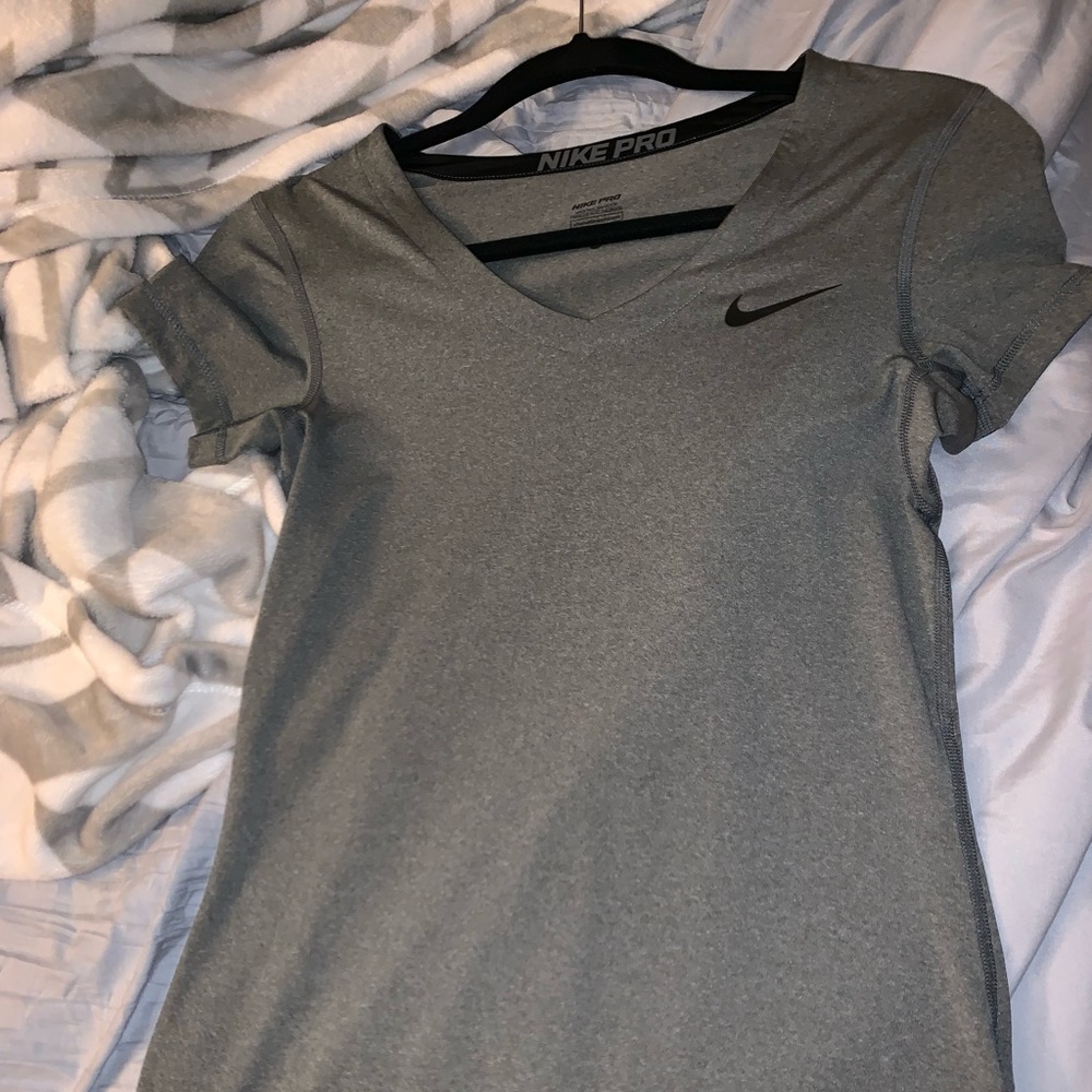 Tight fitting dri fit Nike workout shirt